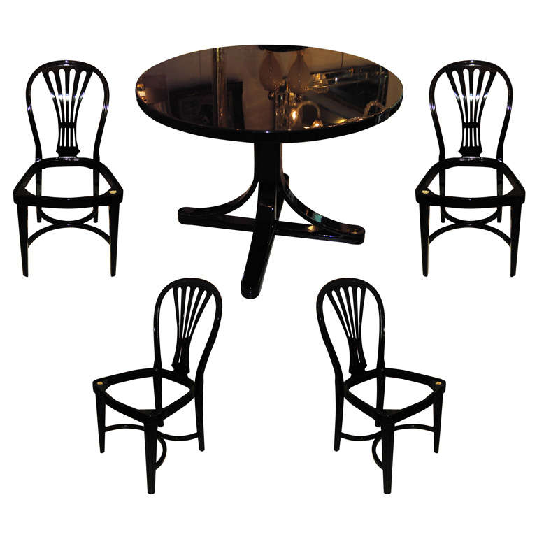 Table and 4 chairs by Thonet