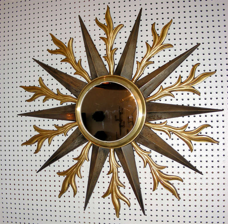 1940s sunburst mirror, attributed to Gilbert Poillerat.