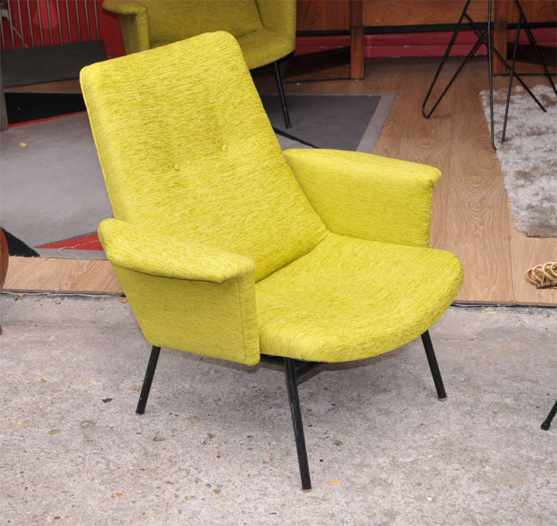 Two 1950s armchairs by Pierre Guariche, covered in new fabric.