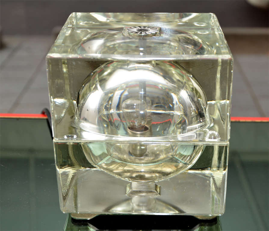 One cubosfera glass lamp, circa 1968, by Alessandro MENDINI  (1931 -  ).
Metal rose upon. Height 7 x width  6 ½ inches.
Prod. Fidenza Vetraria. 
Bibl :  Domus n° 467, Oct.1968, p.38.

Alessandro MENDINI, architecte et designer italien né en 1931,