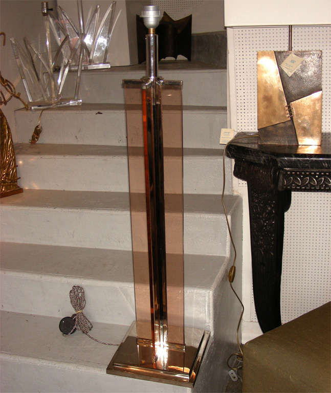 1930s lamp made of glass strips, with chrome metal elements; modernist work executed by Jacques Adnet.