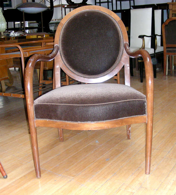 Elegant design Art Deco armchair with a deep and long seating newly recovered in a brown mohair velvet.