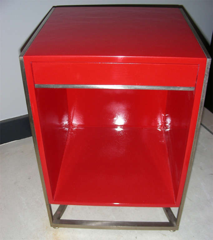 Two 1960s night stands in steel and new red lacquer, with one drawer.