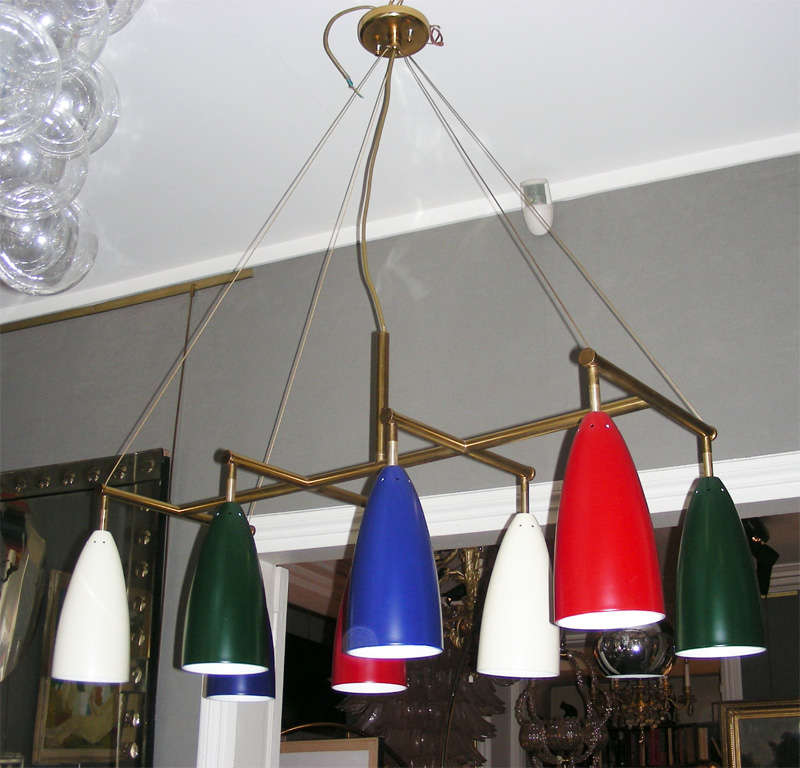 1950-1960 Italian chandelier in metal with gilt and painted sections. 8 lights.
