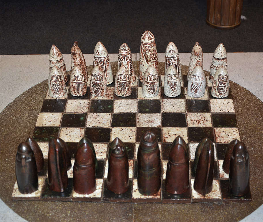 1960s chess game in ceramic, signed by Andrée Hirlet-Albrieux. Each chess piece is 15 cm. high. Dimensions of tray is given below.

For any further information, pictures, shipping quotes, do not hesitate to contact us prior purchasing.