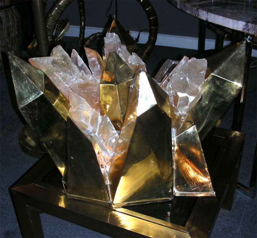 1970s lighted sculpture attributed to Maison Honoré, with a block of gypsum crystals set into a gilt brass structure shaped like rock crystals.