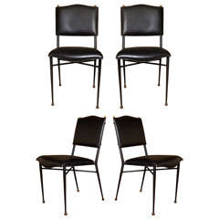 Set of Four Chairs by Jacques Adnet