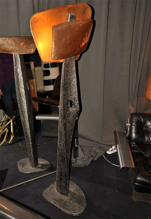 1950-1960 floor lamp in patinated wood and copper, with two lights.