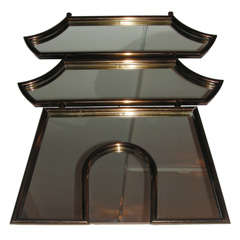 A whimsical mirror in the shape of a pagoda