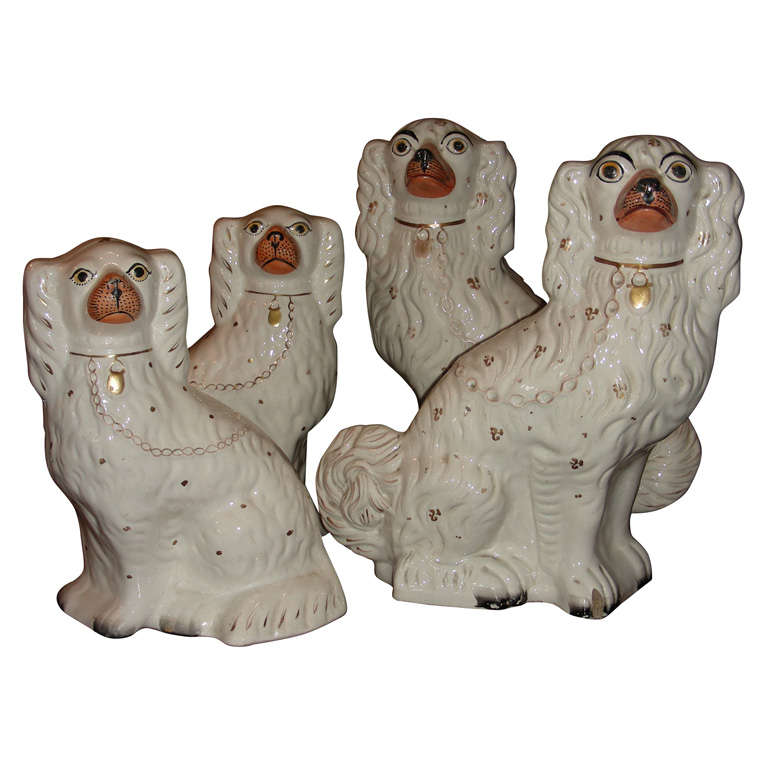 Four 19th Century Staffordshire Pottery Dogs For Sale