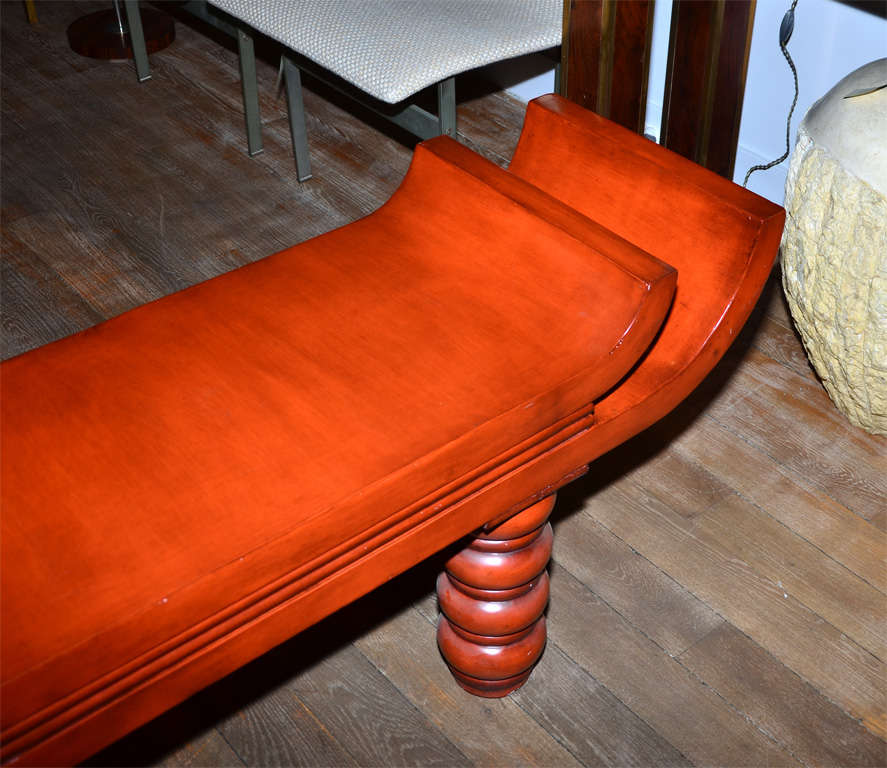 American An unusual red lacquered  bench in the style of Tony Duquette . For Sale