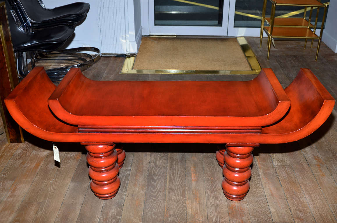 20th Century An unusual red lacquered  bench in the style of Tony Duquette . For Sale