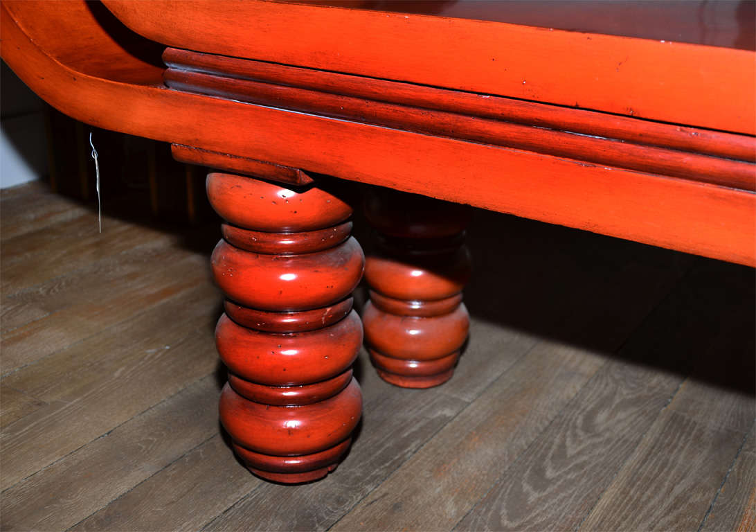 An unusual red lacquered  bench in the style of Tony Duquette . For Sale 1