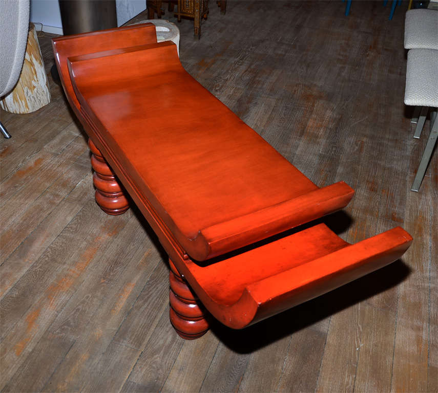 An unusual red lacquered  bench in the style of Tony Duquette . For Sale 2