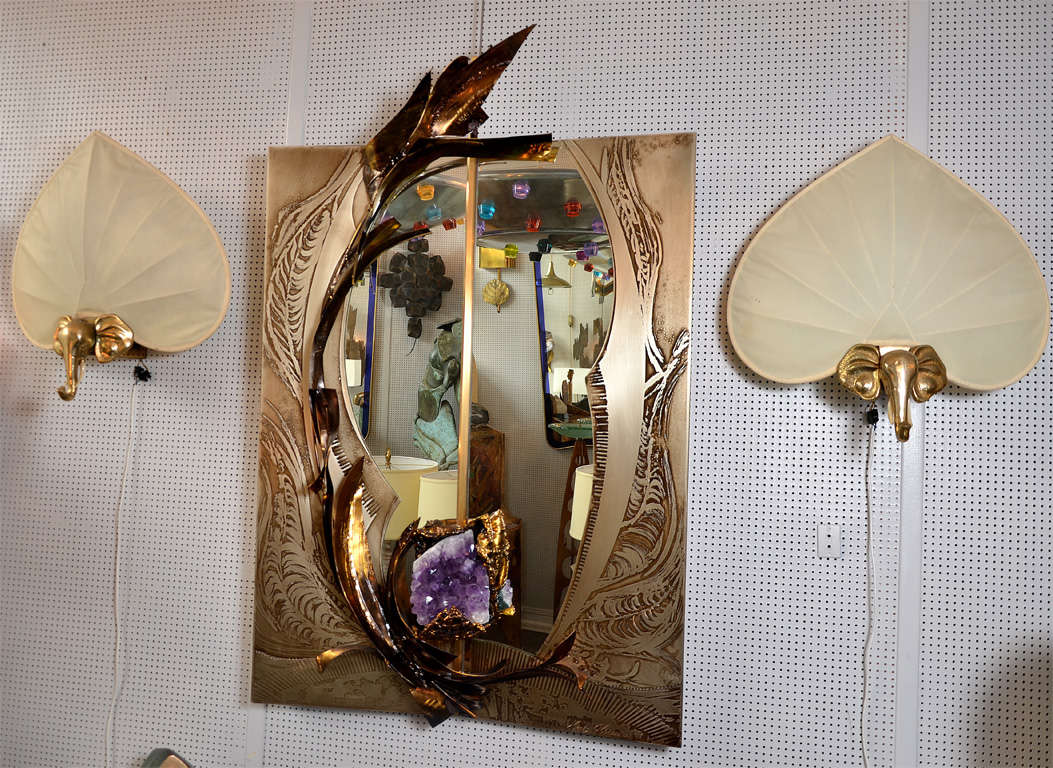 1 of a kind exceptionnal mirror in cast iron with acid work 
with an amethyste in the center