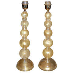 Pair of table lamps in gold Murano glass. Pair of table lamps in gold Murano glass.