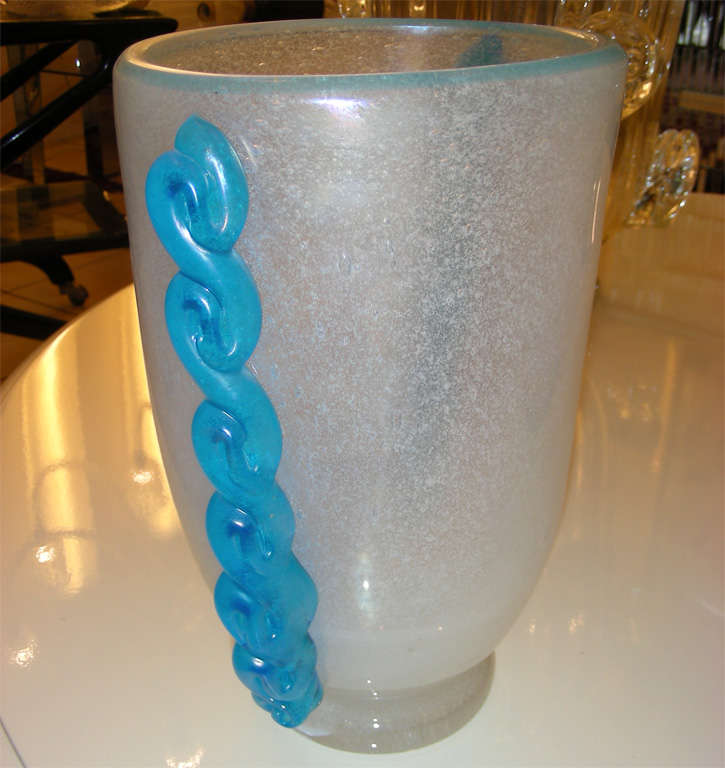 1960s vase signed by Moretti, in cloudy white Murano glass with blue handles.