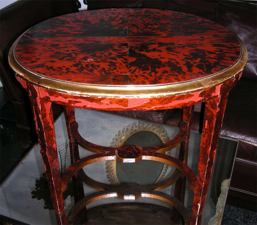 A rare Belgian Tortoiseshell table by Maison Franck Antwerp in a non-restaured condition -primitive -Art object, for collectors.
Oval gilded ribbon