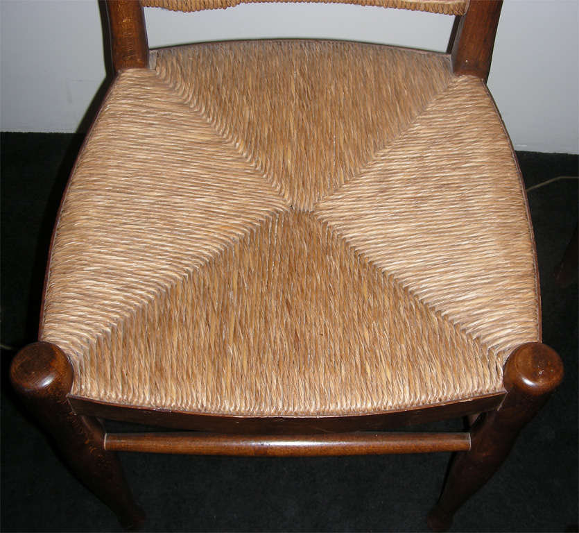 Pair of  wood and rush chairs by  J.E. Ruhlmann. 3