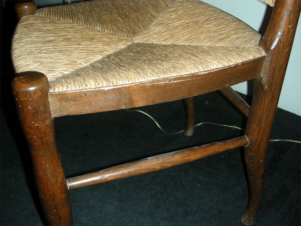 Pair of  wood and rush chairs by  J.E. Ruhlmann. 4