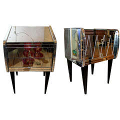 Pair of commodes in mirror.