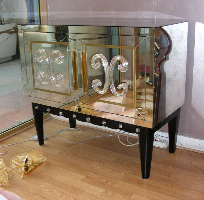 Pair of buffets in mirror and Murano glass.