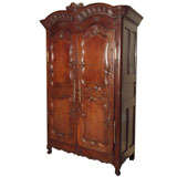 Antique French Louis XV fruitwood armoire.