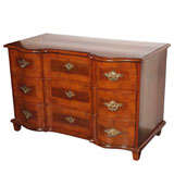 Antique German walnut commode. Serpentine.