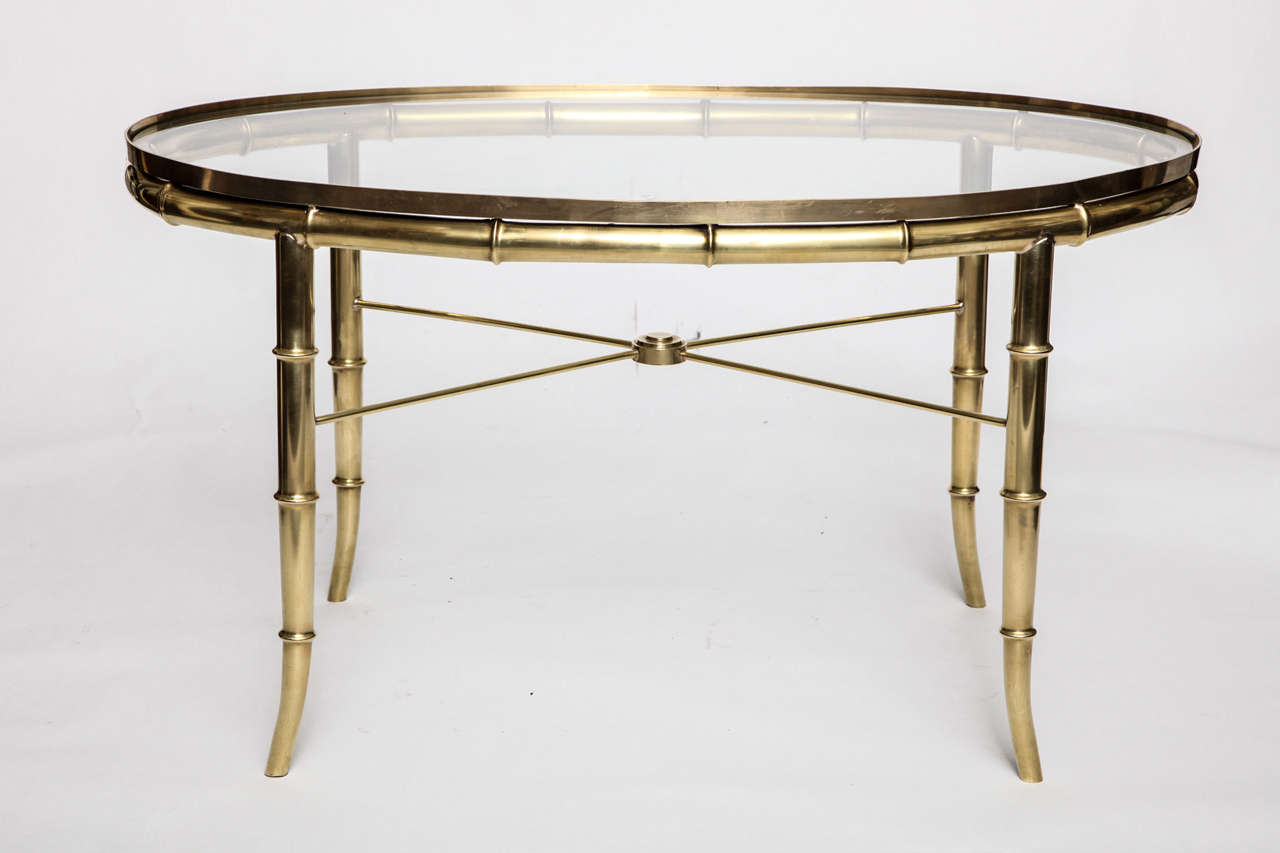 A pair of Italian 1940s faux brass tables.