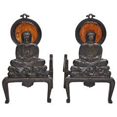 A Pair of 1920's Buddha Andirons of Patinated Iron and Mica