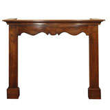 Antique French walnut mantle.  Louis XV.