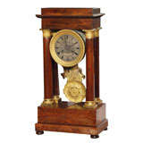 Antique French Empire mahogany and bronze mantle clock.
