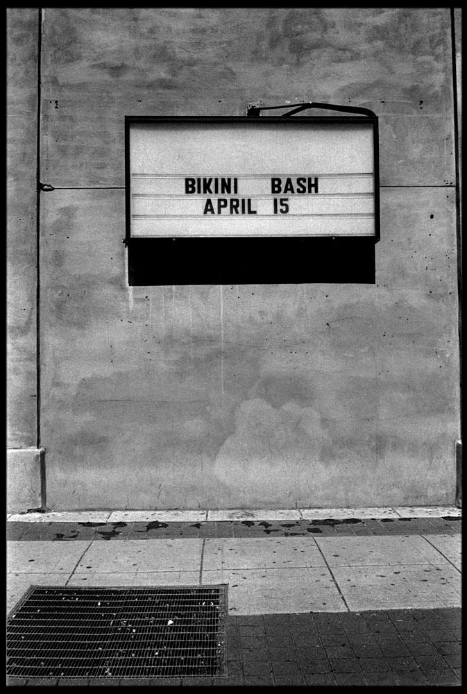 Ted Adams Black and White Photograph - Bikini Bash