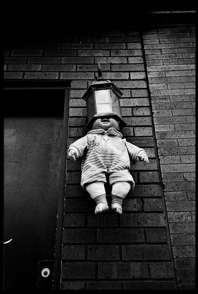 Ted Adams Black and White Photograph - Scary Baby