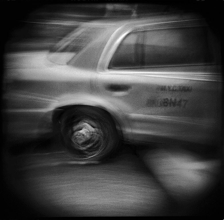 Thomas Michael Alleman Black and White Photograph - "Cab Midtown Manhattan, December 2004", New York, 2004