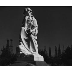 Cemetery Statue and Oil Derricks. Long Beach, CA 1939 2
