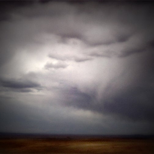 Dale Johnson Color Photograph - Clouds Over Reservation