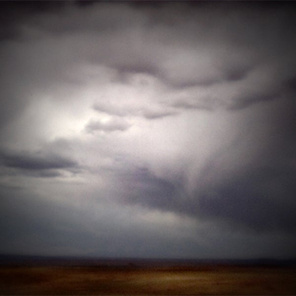 Dale Johnson Color Photograph - Clouds Over Reservation