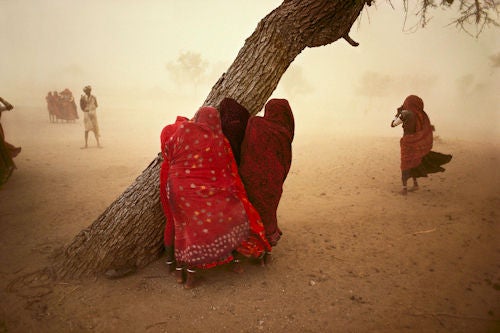 Dust Storm Horizontal - Photograph by Steve McCurry