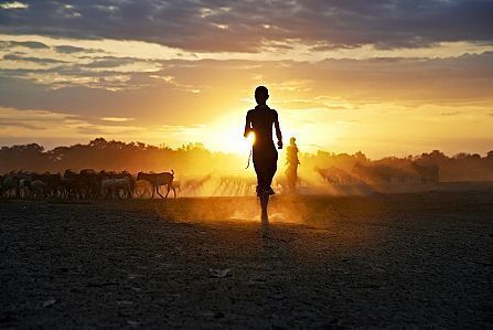 Running at Sunset, Ethiopia - Photograph by Steve McCurry