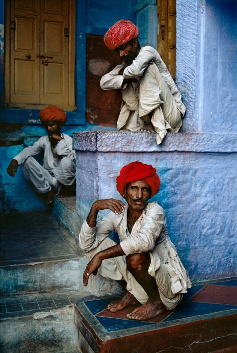 Men on Step, Jodhpur, India - Photograph by Steve McCurry