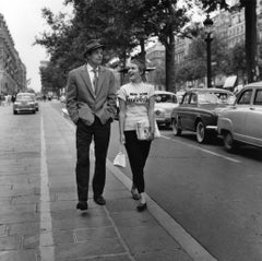 Jean-Paul Belmondo and Jean Seberg off-set on the Champs Elysees
