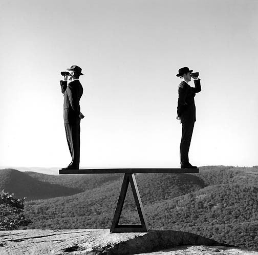 Rodney Smith Black and White Photograph - Two men on see-saw no 2, Bear Mountain, New York 2000