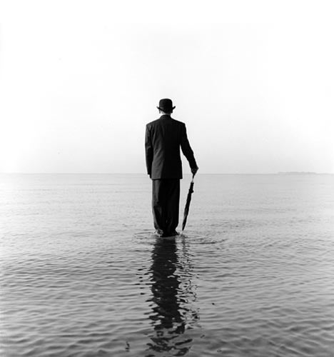 Rodney Smith Black and White Photograph - David standing on water, no 1, Sherwood Island, Connecticut 1997