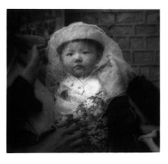 Veiled infant, Gansu Province,  Portrait, China