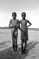 Young boys with their catch of bush rats