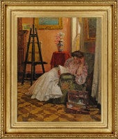 Young woman reading in the studio