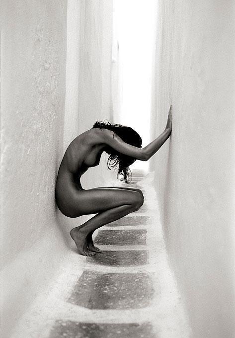 Andreas H. Bitesnich Black and White Photograph - 'Ulrica Mykonos II' - nude between white walls, fine art photography, 1996