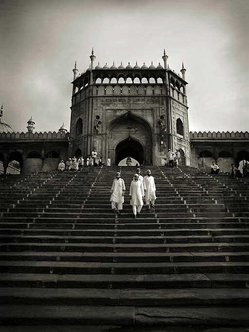 Andreas H. Bitesnich Black and White Photograph - Entrance gate of Jama Masjid, Dehli 2007 - people walking up 