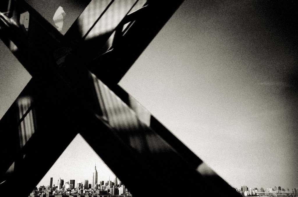Andreas H. Bitesnich Black and White Photograph - Crossing Williamsburg Bridge, USA